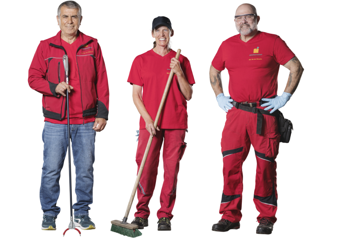 Drei Mitarbeiter eines Wertstoffhofes